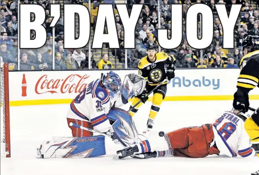  ?? USA TODAY Sports ?? HANK’S GIVING: Rangers goalie Henrik Lundqvist — on his 35h birthday — makes one of several point-blank saves in the scoreless first period of Thursday night’s 2-1 win over the Bruins that snaps a two-game losing streak for the Blueshirts.