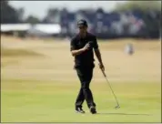  ?? JON SUPER — THE ASSOCIATED PRESS ?? Kevin Kisner of the US putts on the 18th green during the first round of the British Open Golf Championsh­ip in Carnoustie, Scotland, Thursday.