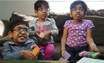  ?? FRANÇOIS BIBER/THE CANADIAN PRESS ?? From left, siblings Muhammad Abdullah, 12, Khadija Amir, 10, and Sara Amir, 8, suffer from Morquio syndrome, which stunts developmen­t, affecting every part of the body except the brain.