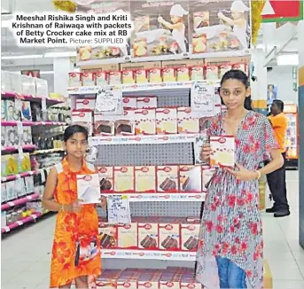  ?? Picture: SUPPLIED ?? Meeshal Rishika Singh and Kriti Krishnan of Raiwaqa with packets of Betty Crocker cake mix at RB Market Point.
