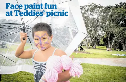  ?? Picture / Michael Craig ?? Racheal Ray, 3, took her doll Baby Girl to the Teddy Bears’ Picnic at Potters Park, Balmoral yesterday. Aunty Rangimarie Takiari said: “Racheal loved it. It was the first time she'd been to a water park. ''