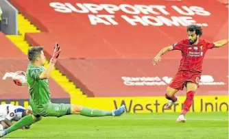  ?? —PHOTOS FROM AP ?? GOAL Liverpool’s Mohamed Salah scores his side’s second goal during the English Premier League soccer match between Liverpool and Crystal Palace last Wednesday.