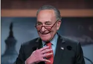  ?? J. SCOTT APPLEWHITE — THE ASSOCIATED PRESS ?? Senate Majority Leader Chuck Schumer, D-N.Y., speaks with reporters at the Capitol in Washington, Dec. 7, 2022.