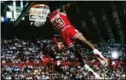  ?? Photo: AFP ?? Michael Jordan in flight.