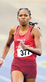  ?? ?? Shanoya Douglas of Muschett High wins the under-20 girls’ 200 metres in 22.85 seconds on yesterday’s final day of the Carifta Trials at the National Stadium.