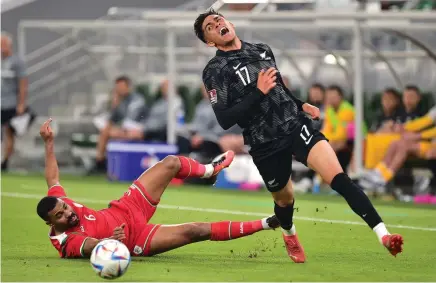  ?? Photo / Photosport ?? All Whites winger Logan Rogerson is fouled is yesterday’s scoreless draw with Oman.