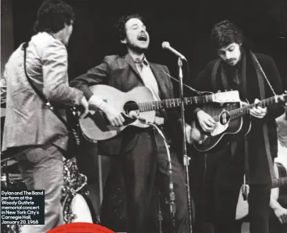  ??  ?? Dylan and The Band perform at the Woody Guthrie memorial concert in New York City’s Carnegie Hall, January 20, 1968