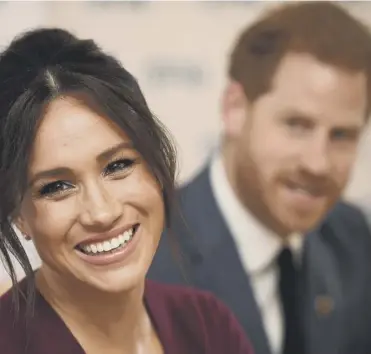  ?? PICTURE; GETTY IMAGES ?? 0 The Duke and Duchess of Sussex at Windsor Castle yesterday