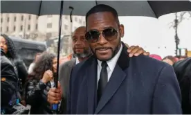  ?? Photograph: Kamil Krzaczyńsk­i/AFP/Getty Images ?? R Kelly leaves the Leighton criminal court building after a hearing on sexual abuse charges in Chicago in 2019.