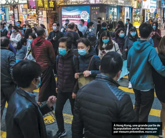  ?? PHOTO AFP ?? À Hong Kong, une grande partie de la population porte des masques par mesure préventive.