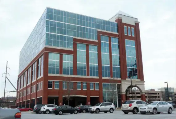  ?? WILLIAM BRETZGER — THE NEWS JOURNAL VIA AP, FILE ?? This photo shows the headquarte­rs of student loan debt collector Navient Corporatio­n, in Wilmington, Del. One of the nation’s largest student loan servicing companies may have driven tens of thousands of borrowers struggling with their debts into high-cost repayment plans. That’s the finding of a Department of Education audit of practices at Navient Corp., the nation’s third-largest student loan servicing company.