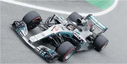  ?? Photo / AP ?? Lewis Hamilton powered to his 82nd pole position with a blistering lap at Interlagos.