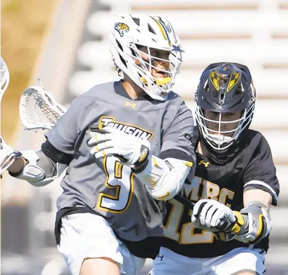  ?? MAURER/TOWSON ATHLETICS LARRY ?? Luke Shilling, a Johns Hopkins transfer who grew up in Baltimore and graduated from Boys’ Latin, enjoyed career highs in goals (four) and points (six) in an 11-10 win over UMBC on Saturday.