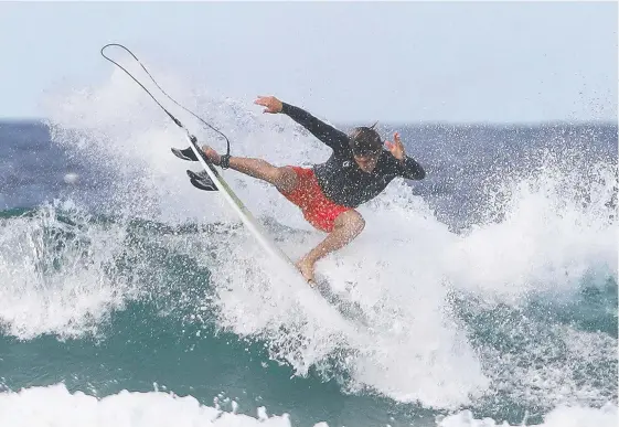  ?? Picture: JASON O'BRIEN ?? World Surf League Tour surfer Jack Robinson enjoys the waves at Fingal on the NSW Far North Coast.