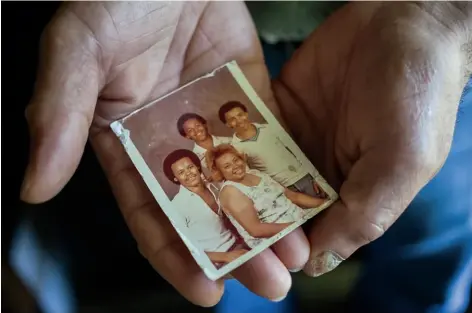  ??  ?? A portrait of Mary Jane Jones and her sons long after the Aretha incident. “I've never seen her perform,” says her son Gregory. “I was too young to seethe shows.”