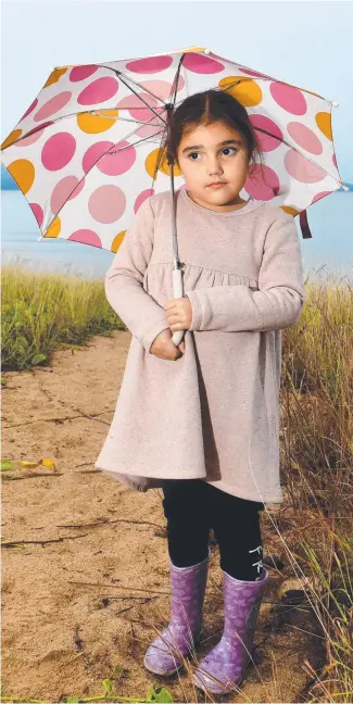  ?? ?? Isabella Jones, 5, can't wait for the sun to shine again on the Strand. Picture: Evan Morgan