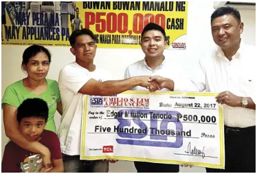  ??  ?? Edgar Tenorio, joined by his family, is the first of five grand raffle winners of ESLA’s P500,000 ‘May Pera Na, May Appliance Pa’ raffle promo. This promotion is in celebratio­n of ESLA’s 50th anniversar­y. Also in the photo are ESLA president Jimmy Lim...