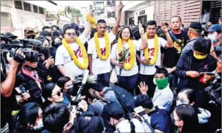  ?? AFP ?? Authoritie­s summoned prominent protest figures to charge them under section 112 at police stations across Bangkok and neighbouri­ng Nonthaburi province on Tuesday.