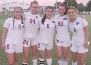  ?? (Photo by Danny P. Smith, SDN) ?? Starkville Academy girls soccer seniors Alyssa Canoy, from left, Milla Davis, Karlee McNeel, Mary Margaret McReynolds and JonHayden Adcock celebrate senior day on Thursday.