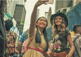  ?? SARAH SHATZ/NETFLIX ?? Lara Jean (Lana Condor, left) and her best friend Christine (Madeleine Arthur) check out the sights in New York City during their senior trip in “To All the Boys: Always and Forever.”