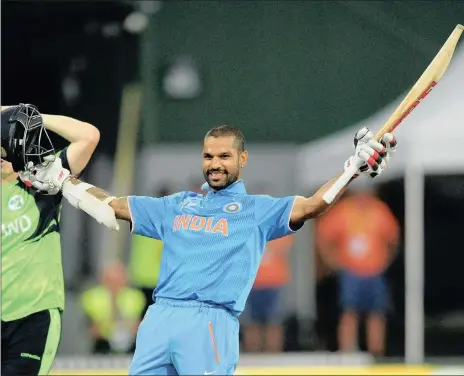  ?? Picture: ROSS SETFORD, AP ?? SPARKLING: India’s Shikhar Dhawan celebrates after scoring a century against Ireland in Hamilton yesterday.