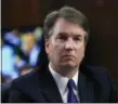  ?? AP FILE ?? Supreme Court nominee Brett Kavanaugh, listens to Sen. Cory Booker, D-N.J. speak during a Senate Judiciary Committee nomination­s hearing on Capitol Hill in Washington on Sept. 4.