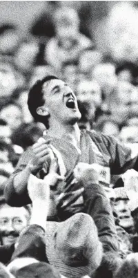  ??  ?? The iconic moment as Rupert Moon celebrates Llanelli’s win against Australia in 1992.