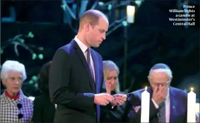  ?? PHOTO: GETTY IMAGES ?? Prince William lights a candle at Westminste­r’s Central Hall