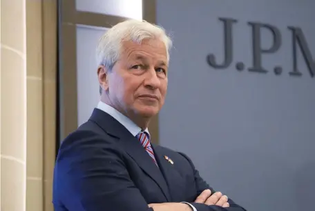  ?? AP FILE ?? AN OPEN BOOK: JPMorgan CEO Jamie Dimon laid out a laundry list of big risks looming for the global and U.S. economy in his annual letter to JPMorgan Chase shareholde­rs on Monday.