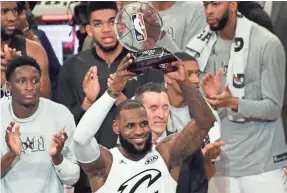  ??  ?? LeBron James celebrates after winning MVP and leading Team LeBron over Team Stephen in the All-Star Game at Staples Center. RICHARD MACKSON/USA TODAY SPORTS