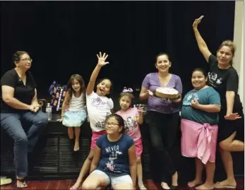  ?? PHOTO COURTESY OF BERTHA WHITE ?? Te Here Polynesian Dance Group celebratin­g Leticia Guicho’s birthday.