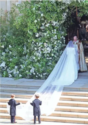  ?? OWEN COOBAN/BRITISH MINISTRY OF DEFENCE/EPA-EFE ?? Meghan Markle’s 161⁄ foot-long silk tulle veil featured flora representi­ng the 53 countries of the Commonweal­th.