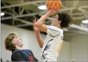  ?? DAILY CAMERA FILE PHOTO ?? Luke Justice, right, leads the Frederick boys basketball team into a Class 5A state quarterfin­al matchup with Mead on Thursday at the Denver Coliseum.