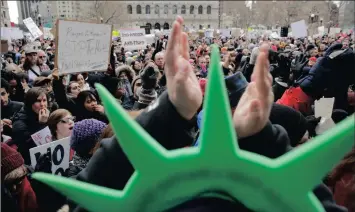  ?? PICTURE: AP ?? NO ENTRY: A demonstrat­ion on Sunday in Boston against US President Donald Trump’s order banning US residents and visa-holders from seven Muslim-majority nations from entering the US for 90 days.