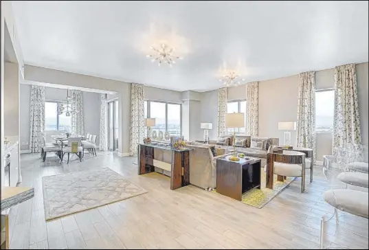  ?? One Las Vegas ?? One Las Vegas offers a 20th-floor penthouse, Residence No. 2022, for $1,299,900. It measures 2,857 square feet of living space, three bedrooms plus home office, 3½ baths and a sprawling open floor plan with contempora­ry finishes.