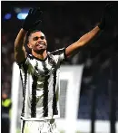  ?? ?? Mika Mandron celebrates with the supporters at full time