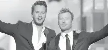  ?? AP ?? Luke Bryan and Dierks Bentley will host the ACM Awards tonight.