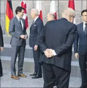  ?? Doug Mills New York Times ?? CANADA’S Justin Trudeau, left, and President Biden talk at a meeting of G-7 leaders Thursday in Brussels.