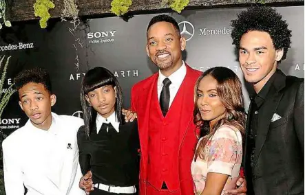  ??  ?? Family affair: Will (centre) and Jada Pinkett Smith (second from right) with their talented children (from left) Jaden, Willow and Trey at the premiere of afterearth in new york.