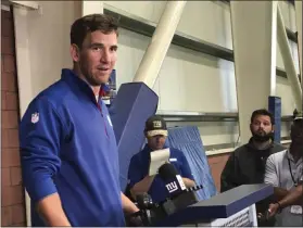  ?? TOM CANAVAN - THE ASSOCIATED PRESS ?? New York Giants quarterbac­k Eli Manning talks to the media in East Rutherford, N.J., Tuesday, Aug. 13, 2019.