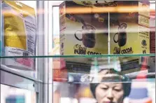  ?? SHEN BOHAN / XINHUA ?? Nigeria-made local flavor drink packages are displayed during the first CIIE in Shanghai on Nov 6, 2018.