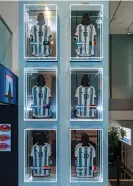  ?? Peter K Afriyie/AP ?? The six shirts worn by Messi during Argentina’s 2022 World Cup campaign on display at Sotheby’s in New York. Photograph: