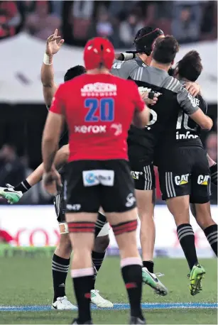  ??  ?? The Crusaders made history by holding on to win the Super Rugby title yesterday.