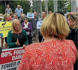  ?? JOHN McCRONE/STUFF ?? Then Earthquake Commission Minister Megan Woods faces the crowd at an EQC protest in 2018.