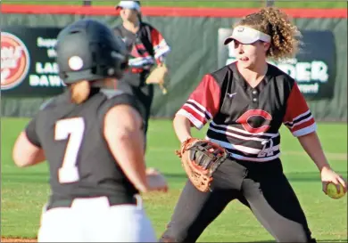  ?? Jeremy Stewart ?? Cedartown’s Marycille Brumby checks the other bases for a play after making a catch for the out at first during a game against Ridgeland at Cedartown High School on Wednesday, Sept. 22, 2021.