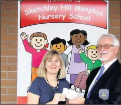  ??  ?? Burbage Crusaders Bowling Club presented Sketchley Hill Menphys Nursery School in Burbage with a cheque for £750.