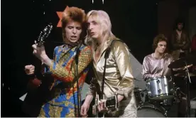  ?? Photograph: ITV/Rex Features ?? Ziggy pop: David Bowie, Mick Ronson and Mick ‘Woody’ Woodmansey of the Spiders from Mars perform on ITV’s Lift Off With Ayshea show in 1972.