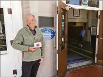  ?? Associated Press ?? Netflix co-founder and first CEO Marc Randolph stands outside the Santa Cruz, Calif., post office in May from which in 1997 he mailed a Patsy Cline CD to determine whether a disc could make it through the Postal System without being damaged. He is holding a small mailbox that Netflix made in its early days to promote the DVD-by-mail rental service.
