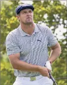  ?? Charles Krupa / Associated Press ?? Bryson Dechambeau has put on 40 pounds of muscle since last season and is waiting to unleash it at Augusta National.