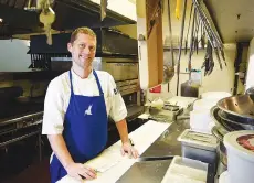  ?? STAFF PHOTO BY TIM BARBER ?? Chef Patrick Halloran in the kitchen at Hummingbir­d Pastaria on Signal Mountain.